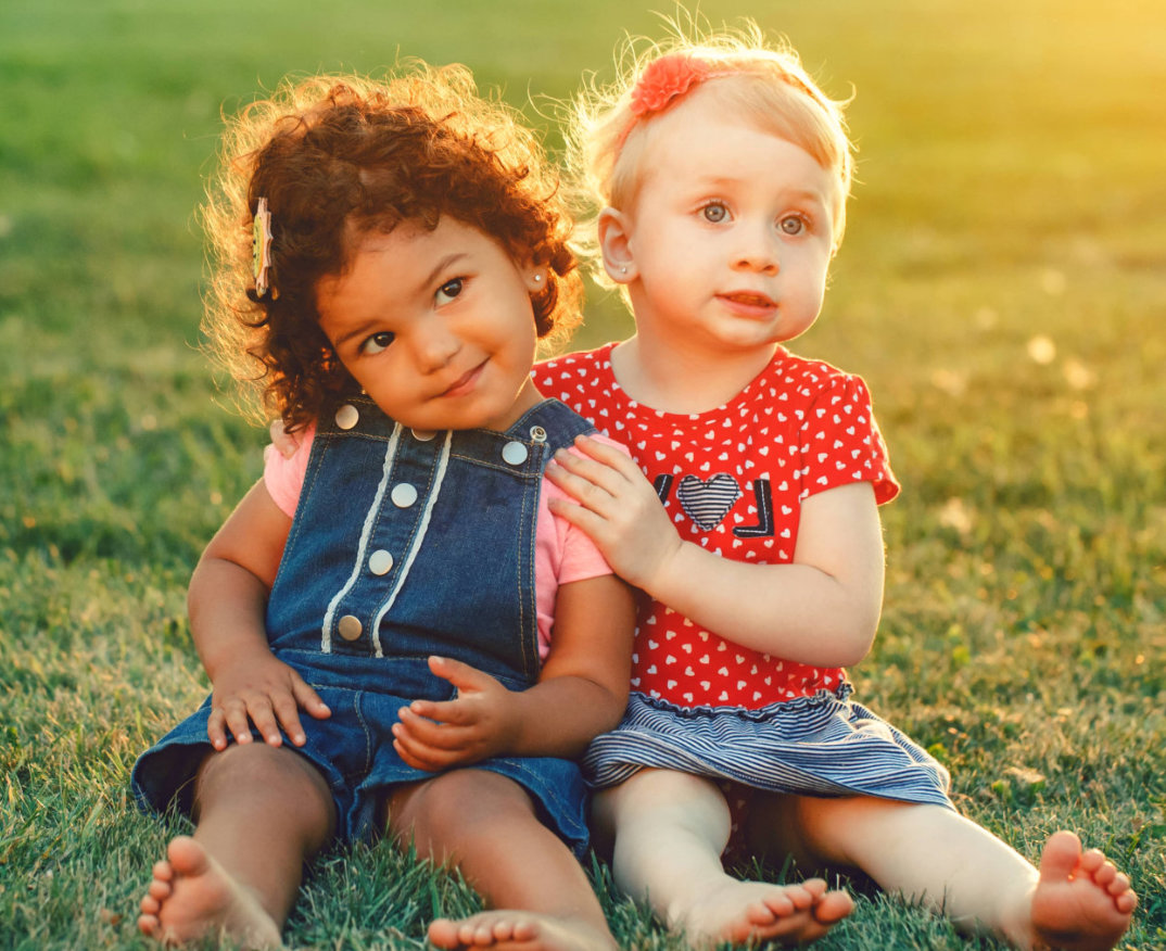 cute toddlers smiling outdoor